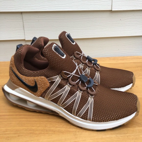 nike shox gravity elemental gold